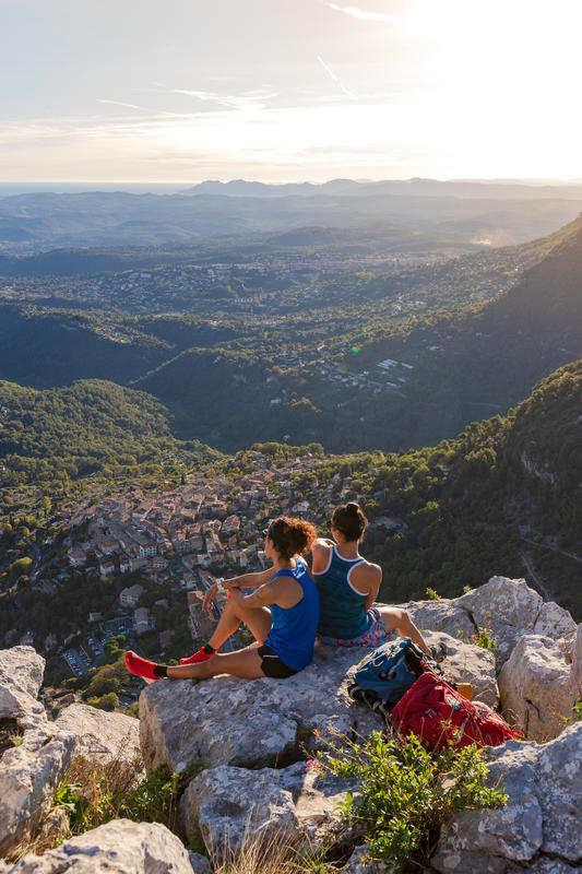two people on top of a hill